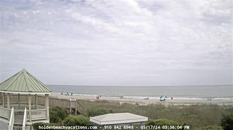 Watch the live webcam of Holden Beach and see the weather, surf conditions and beach activity. The webcam is hosted by Coastal Development & Realty, a local real estate company in Holden Beach, NC.
