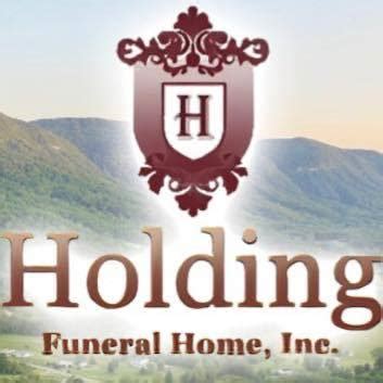 Holding funeral home photos. .  ...