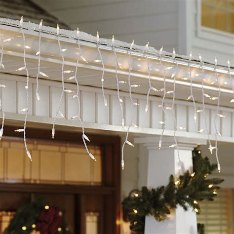 This 14.5-foot Home Accents Holiday Clear icicle incandescent light string connects with up to THREE compatible sets for longer reach and easy expansion, letting you adorn the roofline, hedges or fence. 300 icicle lights brighten up holiday festivities. Suitable for indoor and outdoor use. Clear lights cast a bright glow.. 