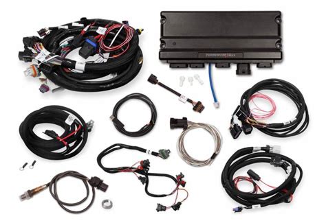 Terminator X and Terminator X Max. Two powertrain management systems from Holley that offer plug and play control for most LS engines starting at just $999. Why settle for a junkyard ECU with a cumbersome aftermarket tuning interface when you can get complete control of your engine, self-learning fuel strategies and the proven, race winning technology of Holley EFI for under a grand! . 