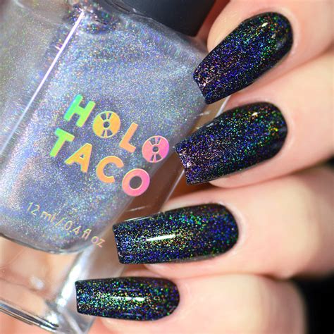 Not even the tax man can catch the shift in this Cats Evasion This multichrome polish is a predominantly deep magenta shade that shifts towards red and then back again through shades of gold, bronze, and rustic green. . Holotaco