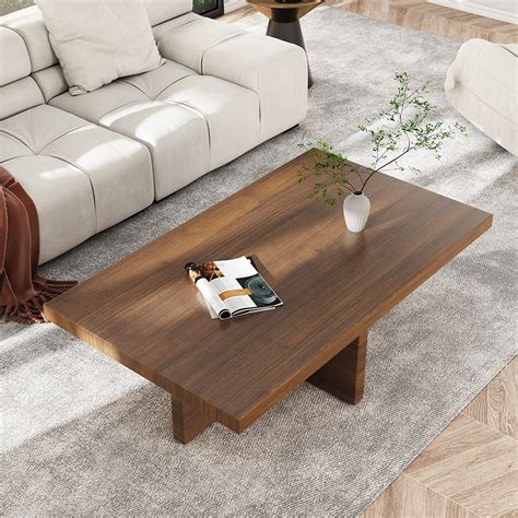 A standard dining table is between 28 and 30 inches high. A coffee table is generally under 20 inches high. The standard height of a table depends on the use of the table and its style. For a traditional formal dining table, the standard he...