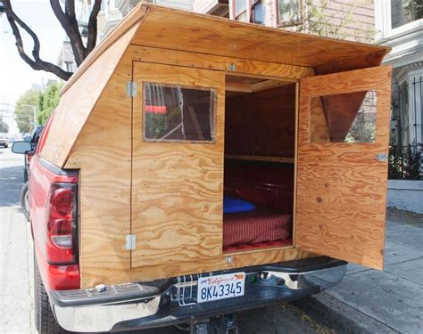 Home built truck topper. This homemade truck camper setup is perfect for either solo truck camping in a traditional truck topper, or for if you’d like to set up the bed of your pickup truck for camping with one of the newer wedge-camper overland truck campers. 