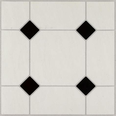 Merola Tile. Metro Penny Matte White with Black Dot 9-3/4 in. x 11-1/2 in. Porcelain Mosaic Tile (8.0 sq. ft./Case). 