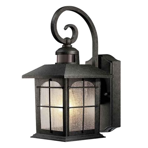 Which products in Outdoor Wall Lighting are exclusive to The Home Depot? The Hampton Bay Lindley Modern 1-Light Matte Black Hardwired LED Outdoor Wall Lantern Sconce with Bubble Double Frame (1-Pack) and Home Decorators Collection 15 in. 1-Light Bronze Outdoor Wall Lantern Sconce with Amber Glass are exclusive to The Home Depot..