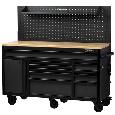 This 61 in. W x 18 in. D 10-Drawer 1-Door Tool Chest and Cabinet Combo provides versatile tool storage options with its 38,198 cu. in. of room. The ball-bearing drawer slides provide smooth operation while a secure-latch retention system ensures that they close completely and securely to keep your tools safe. The top chest has four …. 