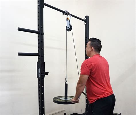 Home gym pulley system. The Titan Wall Mounted Pulley Tower is a tempting home gym addition for those looking to add a cable system/functional tower. Cost-effective cable systems are typically rack-attached, and they are unable to change handle locations like your traditional functional trainers. The Titan Pulley Tower is less expensive than nearly all cable … 