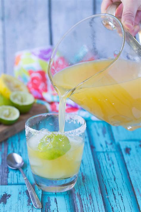 Home made margarita. Gently dip the rim of the glass into the salt to coat. Fill your cocktail shaker with ice cubes. Add tequila and orange liqueur (and simple syrup if using) and shake vigorously for about 20 seconds. Strain tequila mixture over ice (if … 