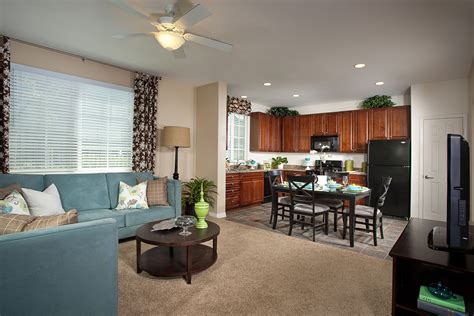 Homecoming terra vista. If you're looking for a new place to call home, look no further than The Enclave at Homecoming Terra Vista. We offer gorgeous one-, two-, three-, and four- bedroom apartment homes featuring amenities such as direct access garages, quartz countertops, dark maple cabinets, wood laminate plank flooring, and ceiling fans. 