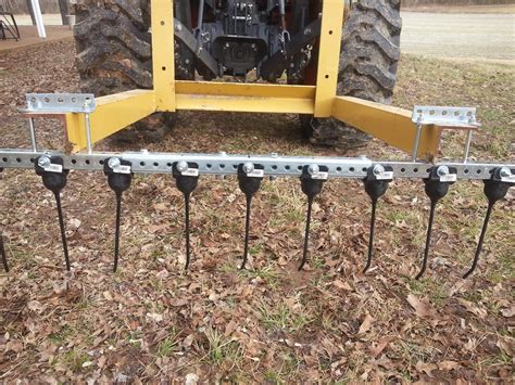 Homemade landscape rake tines. These are excellent tractor parts to have on hand, particularly if you frequently work with landscaping, gardening or farming. Each rake tine measures 1 inch x 5/16 inch and has a 3/8 inch bolt hole. Specifications. 2- hole landscape rake tine. High strength 5160 Steel. Heat treated to 38-42 Rockwell. 1 inch x 5/16 inch. Two 3/8 inch bolt holes. 