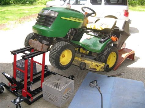 2010 Deere X300 with 42" deck with mulch kit, Deere 40" shovel, Brinly plug aerator, Brinly 125 lb spreader, Homemade Dethatcher on shovel, Craftsman 38" lawn sweeper. ($15) ... MoJack Lawn Mower Lifts, Jacks and Hand Trucks-The MoJack They have models which easily handle the X700 series.. 