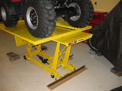 Several people have been curious about this small tractor work rack that I made. I really have enjoyed it. If you have more than one lawn tractor or are rest.... 