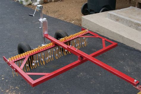 Homemade tractor rake. Rake is going to be about 58 wide (roller width), utilizing a 1:1 gear box with 20T and 10T sprockets to cut the RPMs in half. ... Tractor Kubota B2910, Cub Cadet Pro Z 154S, Simplicity 18 CFC, Cub Cadet 782. Cool project ... looking great so far ... nice job :thumbsup: Sep 13, 2014 / Power Rake build #5 . GolfAddict Veteran Member. Joined 