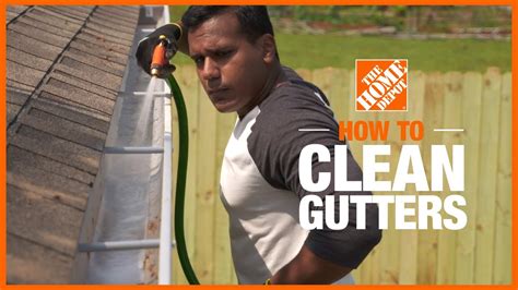 Homeowners clean their gutters from the safety of the GROUND ... - YouTube