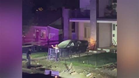 Homicide suspect crashes into front yard after police chase