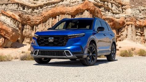 Honda cr v 2024 hybrid. Take on big adventures in the 2024 CR-V, with an available hybrid powertrain, rugged exterior styling, a spacious cabin, ... The 2024 CR-V boasts a rugged design, with a long wheelbase and wide stance. ... ©2024 American Honda Motor Co., Inc. All information contained herein applies to U.S. vehicles only. 