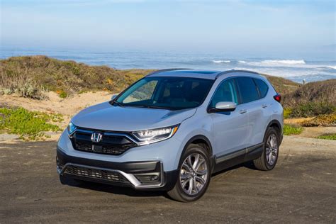 Honda cr v touring. CR-V LX vs. EX. When you take the first step up the CR-V trim ladder, you can expect big upgrades to the interior with heated seats, power driver's seat, and ... 