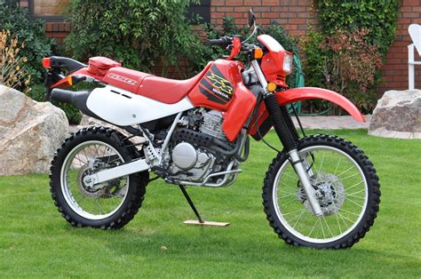 Honda xr 650 for sale. 2024. 2023. 2024. OVERVIEW. GALLERY. TRIMS. FEATURES. SPECIFICATIONS. BUILD. 2024 XR650L. BASE MSRP: $6,999. Destination Charge: $600.00. Available Color. BUILD Get My Quote Search Inventory. DO-IT-ALL DUAL-SPORT. A true Honda classic, there’s a reason the XR650L continues to have a hugely loyal following. 