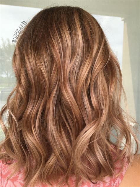 Honey blonde caramel hair. Caramel Honey Blonde Highlights are a cool, everyday look that can be achieved by using a balayage technique. Caramel honey blonde highlights are optimal for medium to light brown hair. This color is perfect if you want a classic low-maintenance look and have a 2016 or 2017 yearning. Honey Caramel Hair Color 