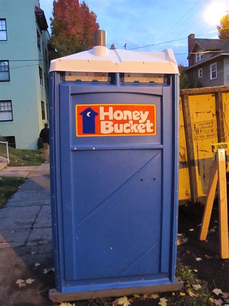 Honey bucket portable toilets. The blue liquid you find in the bottom of a portable toilet is a really, really powerful deodorizer with disinfectant properties meant to help combat the smells that are produced in a portable restroom. Portable restroom providers add that blue liquid to keep the restrooms smelling fresh over time. In the past, formaldehyde was the deodorizer ... 