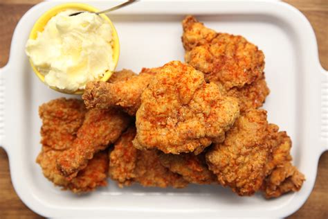 Honey butter fried chicken. Learn how to make crispy and juicy fried chicken with a honey butter sauce. This recipe requires brining, battering, frying and seasoning the chicken, as well as making the honey butter from scratch. 