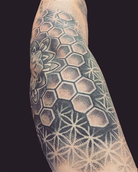 Honeycomb filler tattoo. Honeycomb and Bee. A honeycomb and bee tattoo is a popular choice for those who want to showcase the symbiotic relationship between bees and honey. The honeycomb can represent the hard work and community of the bees, while the bee can represent the sweetness of honey. This tattoo can be designed in a variety of styles, … 