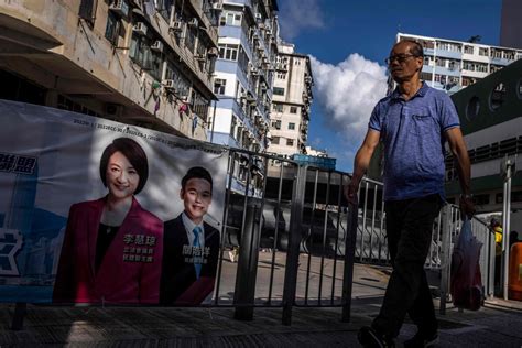 Hong Kong changes law to slash directly elected council seats, undermining democratic challenges