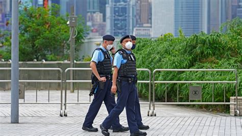 Hong Kong security police arrest wife of prominent activist