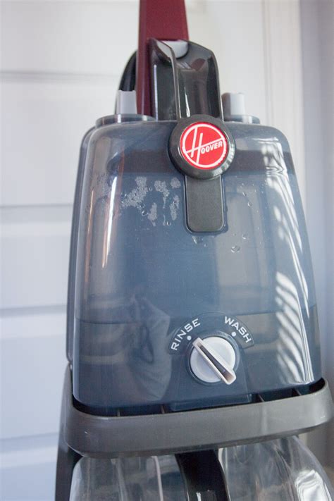 Hoover spinscrub 50. Pull the collar of the solution tube so the black tabs extend and then open the door labeled "stair/upholstery cleaning solution." Attach the solution tube to the round port inside this door and secure the connection with the black tabs. Place the tank and the lid back on the Hoover. Now, you're ready to set up your Hoover to clean upholstered ... 