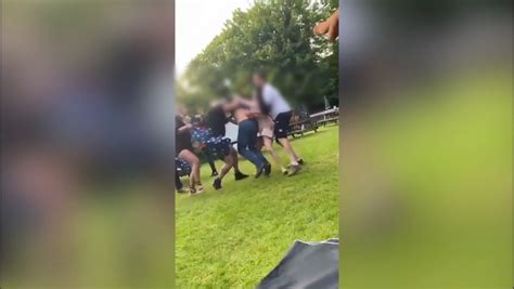 Horrific moment brawling man spits out bloke’s EAR during