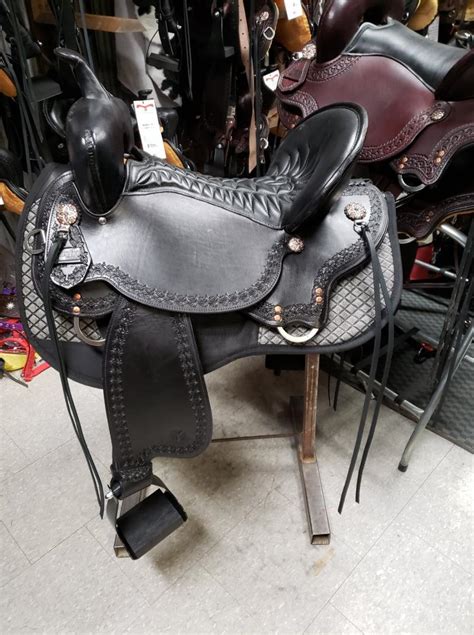 **WOW L@@k CIRCLE Y HORSE TACK WORLD SADDLES**are designed to CORRECT body postion & eliminate popping during your run**they are SUPER light weight around 19 pounds**they are all forward hung fenders & twisted to take off knee pressure**they are ALL made on upgraded leather & hand tooled**they have a 5" cantle deep pocket & a 9" swell**flex2 .... 