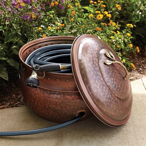 Decorative Garden Hose Holder Storage Pot with Lid | Copper Hose Container Pot Outdoor or Indoor Use | Expandable Water Hose Hider | Holds 100 ft Hose. 4.3 out of 5 stars. 372. 50+ bought in past month. $149.95 $ 149. 95. List: $159.95 $159.95. $10.00 coupon applied at checkout Save $10.00 with coupon.. 