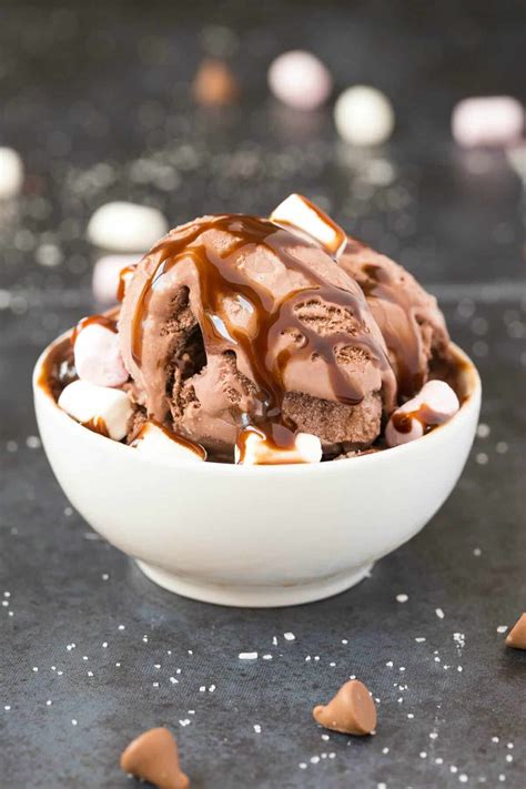 Hot chocolate ice cream. Chop the chocolate into small pieces. Melt in a double boiler or by microwaving for 30 seconds at a time, stirring between each time, until fully melted. Add the hot chocolate mix and sugar to the melted chocolate. Stir until blended. Slowly add half a cup of the milk, and stir until smooth. 