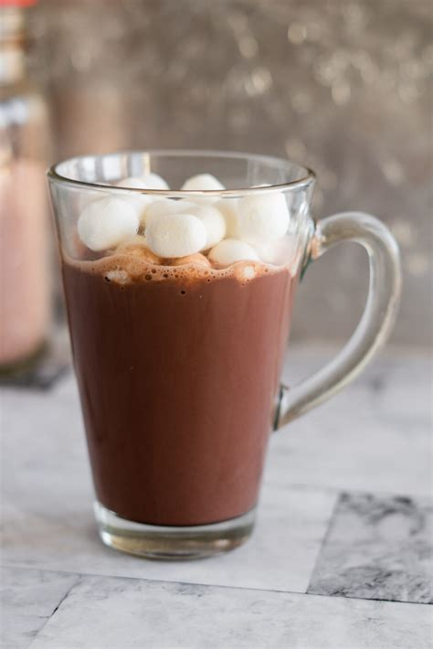 Hot chocolate milk. In a large bowl, sift together the dry milk, powdered sugar and unsweetened cocoa. Mix in the regular sugar by hand. Store in an airtight container in a cool dry place to up to 3 months. To make hot chocolate, combine 1/3 cup dry hot chocolate mix with 1 cup hot milk or water, stir well until dissolved. Add desired toppings and add-ins. 