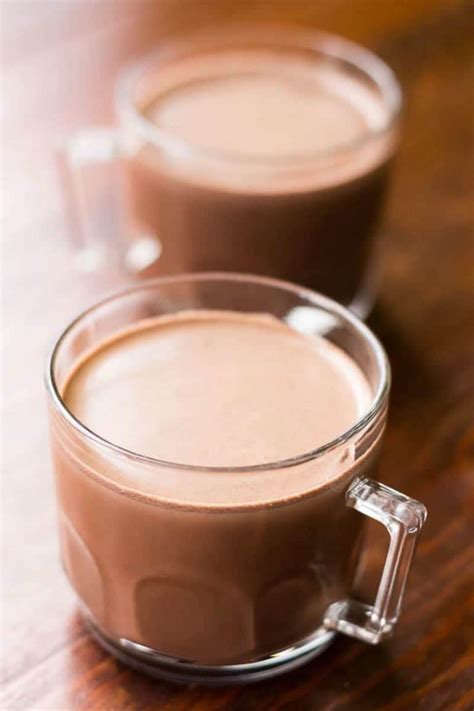 Hot chocolate with chocolate milk. Instructions. In a small pot measure in the milk and on medium temperature heat (to just under boiling). Boil water. Add espresso powder to cup along with the hot water and stir. Once milk has come to temperature, remove from heat and froth. Pour hot milk into coffee cup and stir. Add the froth on top. 