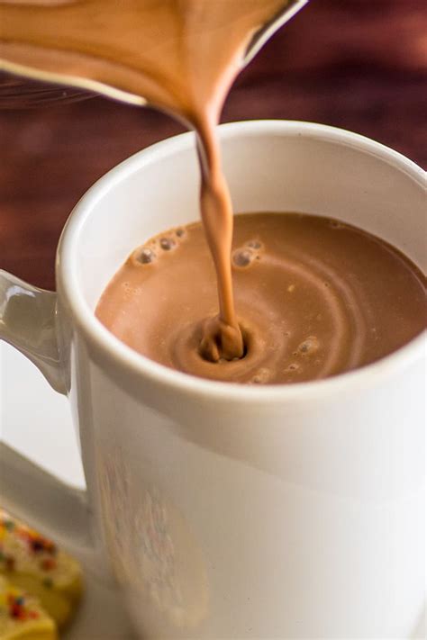 Hot chocolate with hot milk. Instructions. Combine all of the ingredients into a 6-quart slow cooker bowl. Whisk vigorously until cocoa powder has dissolved and ingredients are well combined (about 5 minutes). Cook for 2-3 hours on low setting while whisking occasionally to prevent the chocolate from burning on the bottom. 