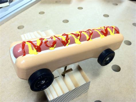 Hot dog pinewood derby car template. Plans include car template patterns, painting schemes and speed tips. If you want to cut your pinewood derby car, a jigsaw is a suitable tool for the job. Web create and format impressive car designs with images of a monkey with a wedge and dremel or a shark eating a hot dog with our cool pinewood derby templates. The cars designs below with ... 
