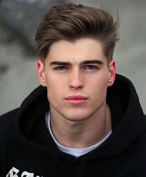 Hot guy hairstyles. The medium brush up is what quickly became one of the most popular men’s hairstyles in 2019, and it’s likely to stay that way for the foreseeable future. This medium version provides a lush and full look, but you’ll need something strong to keep it in place all day. Hair clay, wax or putty are all good options. 