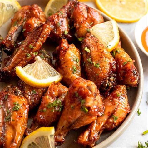Hot lemon pepper wings. In another large bowl, whisk together the flour, garlic, ½ tablespoon salt, and 1 tablespoon pepper. Working in 3 batches, transfer the wings to the flour mixture and … 