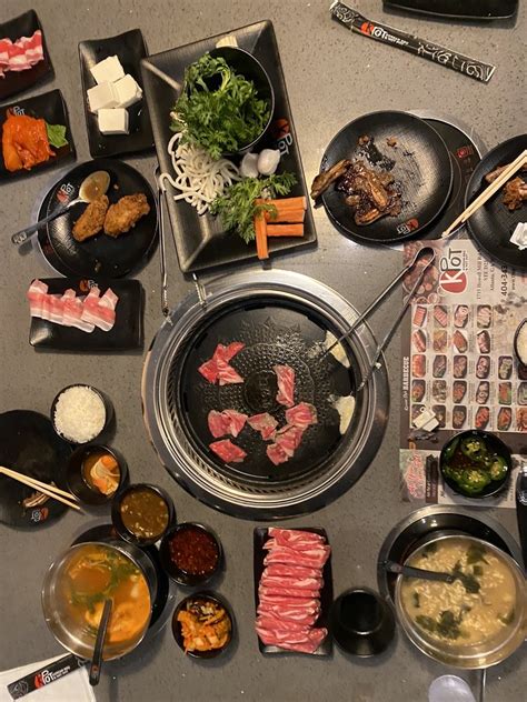THIS. IS. KPOT. We have too many delicious options to choose from. What is your go-to entrée? 朗 #kpot #kpotbbq #hotpot #rollinghotpot #ayce.... 