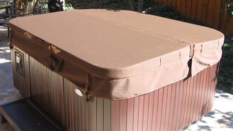 Hot tub cover replacement. They lead the industry in producing highly energy-efficient hot tubs and hot tub covers. Our rigid, vinyl hot tub covers tightly lock in heat with 1.5 lb. and 2.0 lb. foam cores that increase the R-factor of the cover for additional energy efficiency. The correct spa cover will save you money on your energy bill by holding in the heat. 