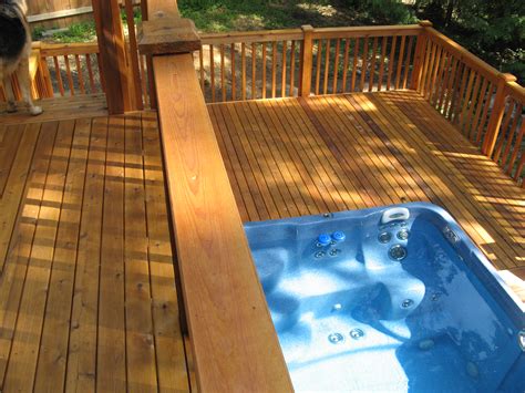 Hot tub on deck. Average Weight of Person = 185 lbs. Square Feet of Hot Tub = Varies depending on the chosen model. Using the values above, use the following formula to calculate the weight a hot tub will put on … 
