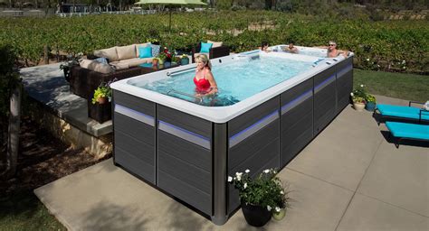 Hot tub swim spa. Relax and swim in your own backyard year-round with the Jacuzzi® Swim Spa Collection. Engineered to be the most energy efficient swim spas in the world, … 