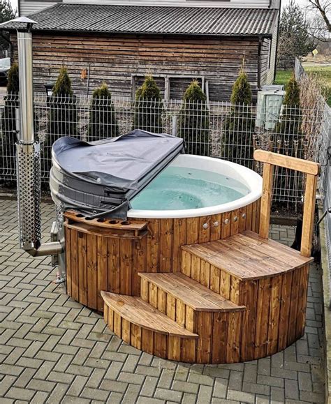 Hot tub wood fired. Nov 28, 2017 ... ​How to Build a Wood-Fired Hot Tub · Choosing a Location · Setting Up the Tub Foundation · Install the Drain · Standing the Staves &mid... 