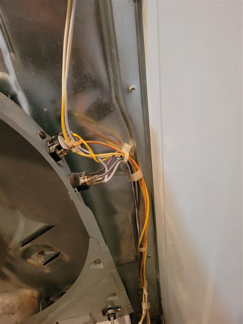 Set your meter to check continuity and put your meter probes on COM and NO. Your meter should show 1 or OL (OPEN LEAD). Push the switch and your meter should read 0 or closed (GOOD CONTINUITY). If the door switch is good, then check the dryer broken belt switch.. 