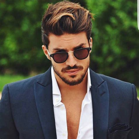 Hottest male hairstyles. Get to know the Men's latest hair trends in 2024 from one of the most prominent hair blogs for men. Crew cut, Ceasar cut, pompadour, comb over, layer, curly, emo, man bun, top knots, flat top, taper, high and tight military haircut, conk, cornrow, dreadlock, ducktail, jewfro, top fade, Jheri curl, Mullet, mohawk, ponytail, quiff, razor cut, slick back, spiky, undercut, wavy, messy etc all ... 