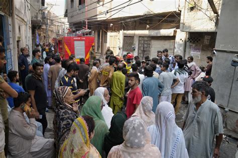 House fire kills 4 adults and 6 children in Pakistan, rescuers and police say