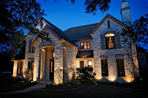 House uplighting. Use Uplighting And Moonlighting. There are two ways to draw attention to tall landscape features in front of your house: uplighting and moonlighting. Installing well- or directional lights that point upward under trees or other architectural features is known as uplighting. Moonlighting imitates the moon’s spillover effect on a building. 