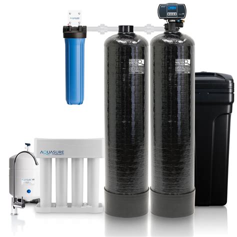 House water softener. The water softener process begins when water enters the top of the softener tank and percolates through the resin beads. The resin beads have a negative electric charge, which attracts the positive charge of hard water particles such as calcium and magnesium. The particles, called ions, remain on the beads and soft water exits the tank for use ... 