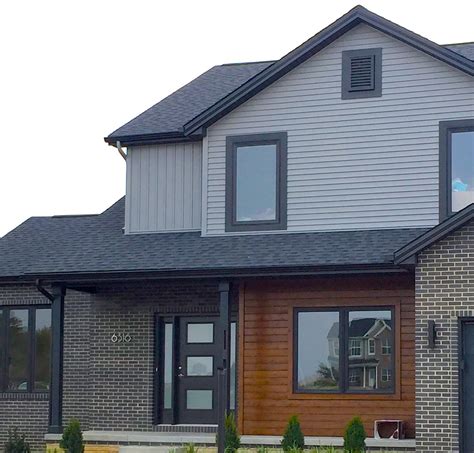House with black siding. Explore various modern homes with black siding, whether it be wood, steel, or another material. See how black can create a sleek, cozy, or dramatic effect on different architectural styles and landscapes. 
